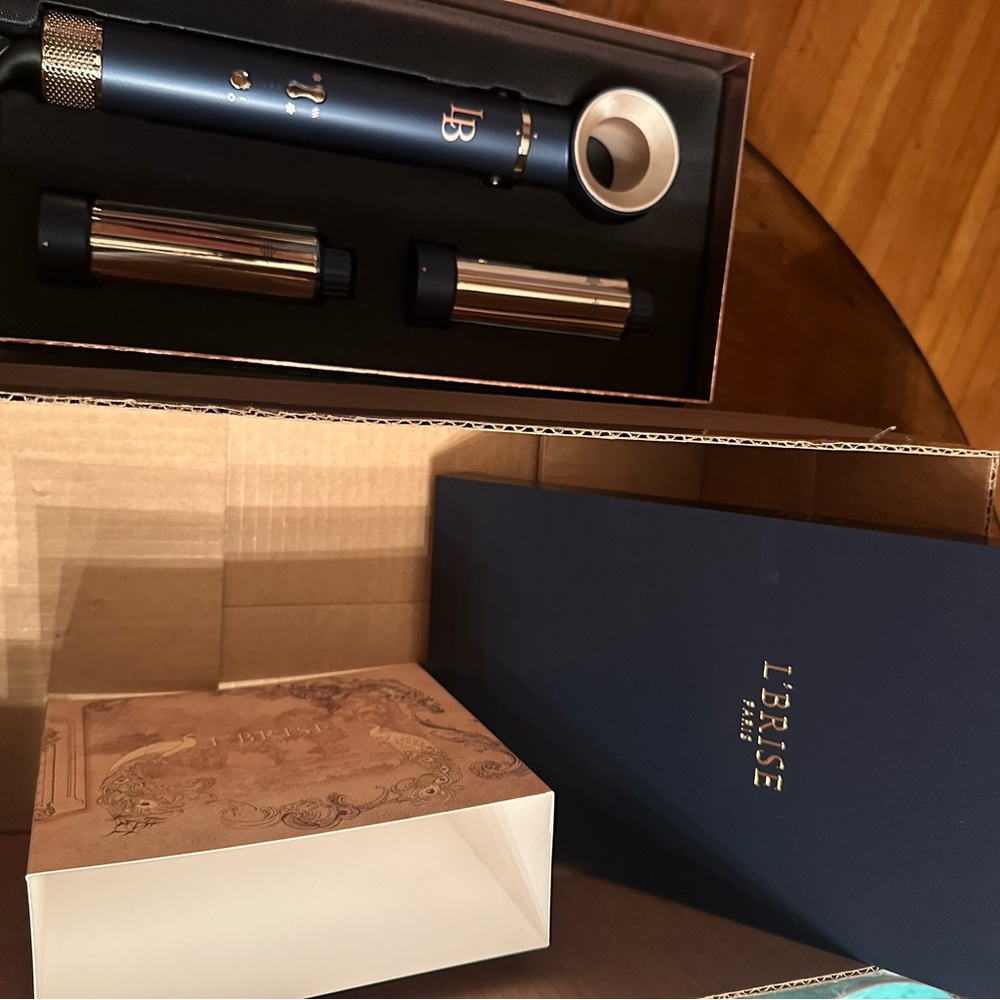 L’Brise Air Styler. Brand new with attachments. Straight from delivery box. $115